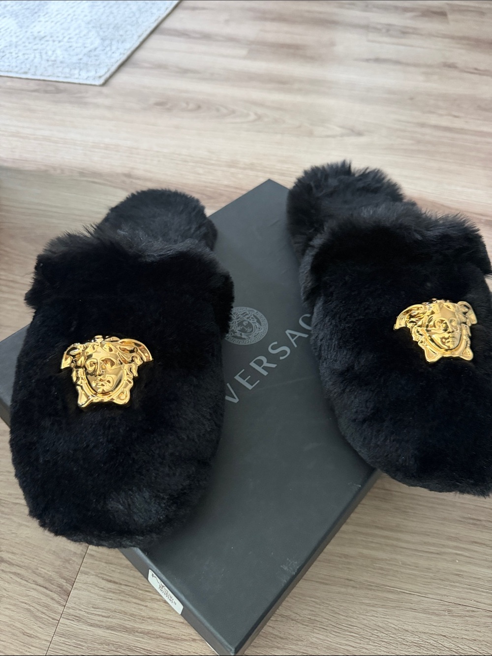 Versace Black Faux-Fur Medusa Slip Ons with Gold Emblems